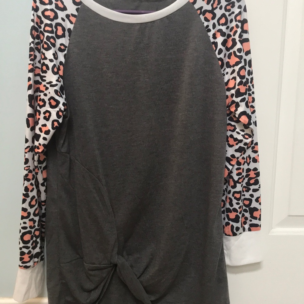 Grey top with leopard print sleeves